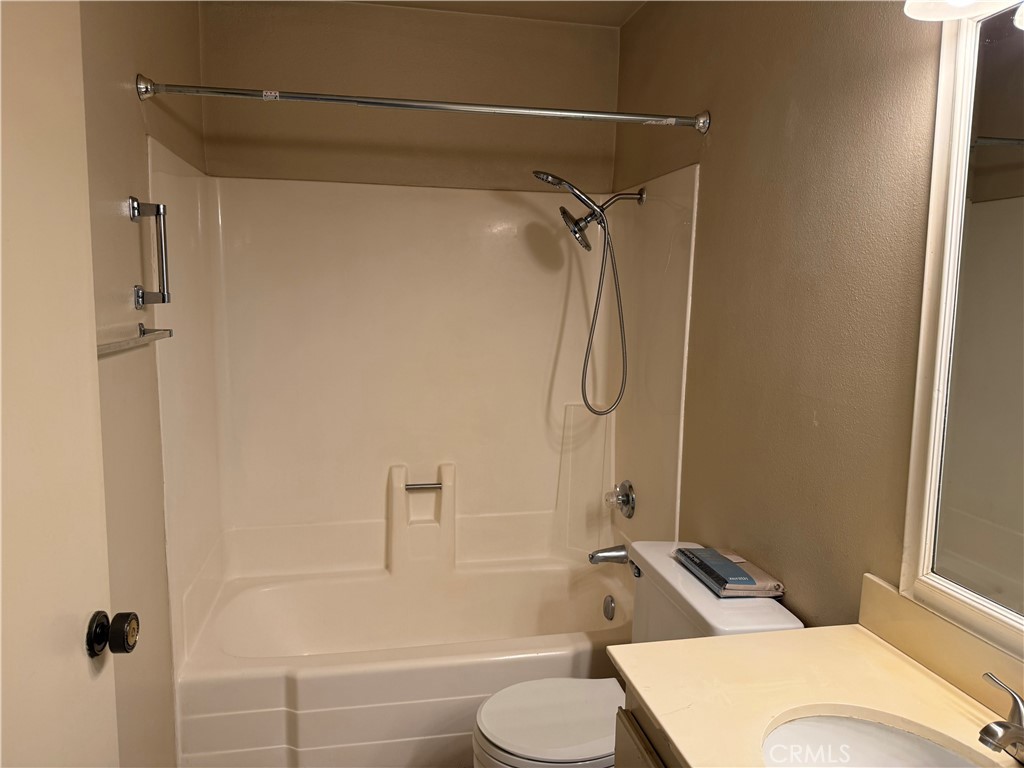 122 Tangelo Irvine, CA 92618 - Photo 22 of 34 a bathroom with a sink toilet and shower