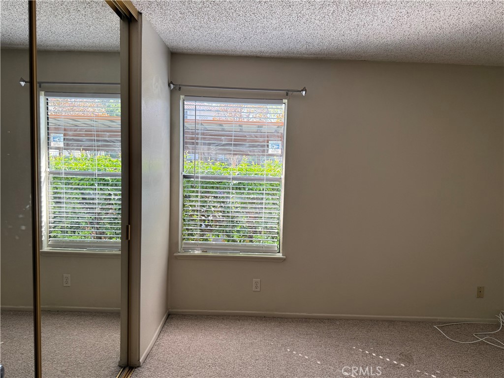 122 Tangelo Irvine, CA 92618 - Photo 26 of 34 a view of an empty room with a window