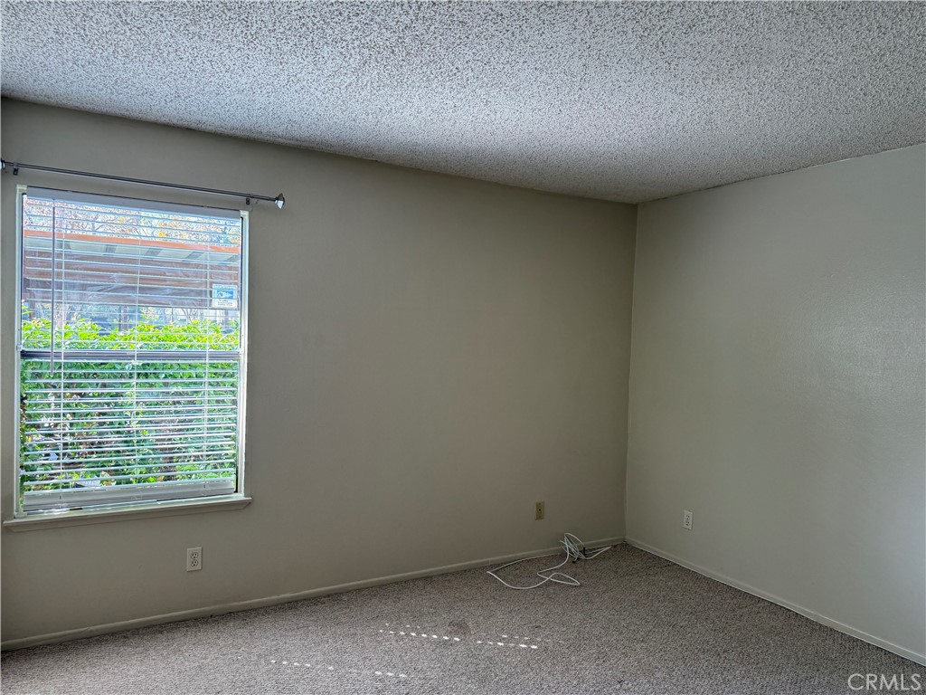 122 Tangelo Irvine, CA 92618 - Photo 27 of 34 a view of an empty room with a window