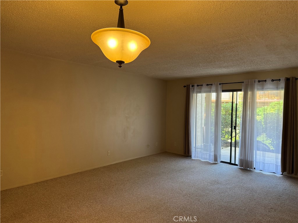 122 Tangelo Irvine, CA 92618 - Photo 5 of 34 a view of an empty room with a window