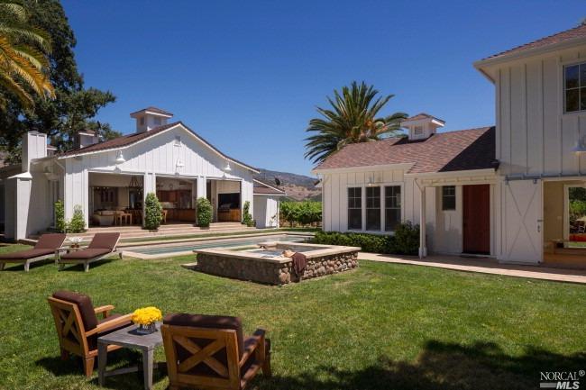 5615 Silverado Trail Napa, CA 94558 - Photo 1 of 1 a front view of a house with garden and porch
