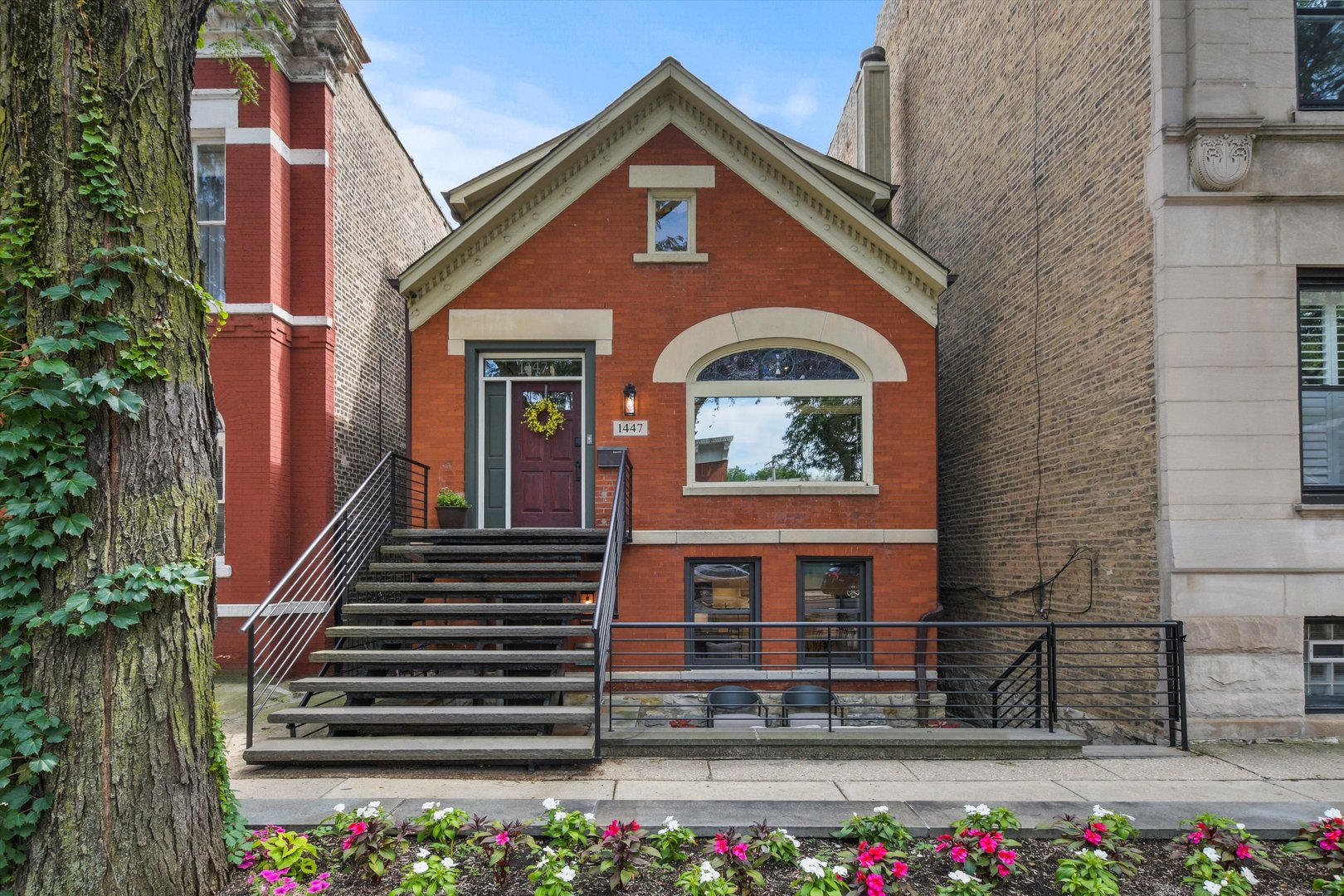 1447 West Flournoy Street Chicago, IL 60607 - Photo 1 of 41 a front view of a house