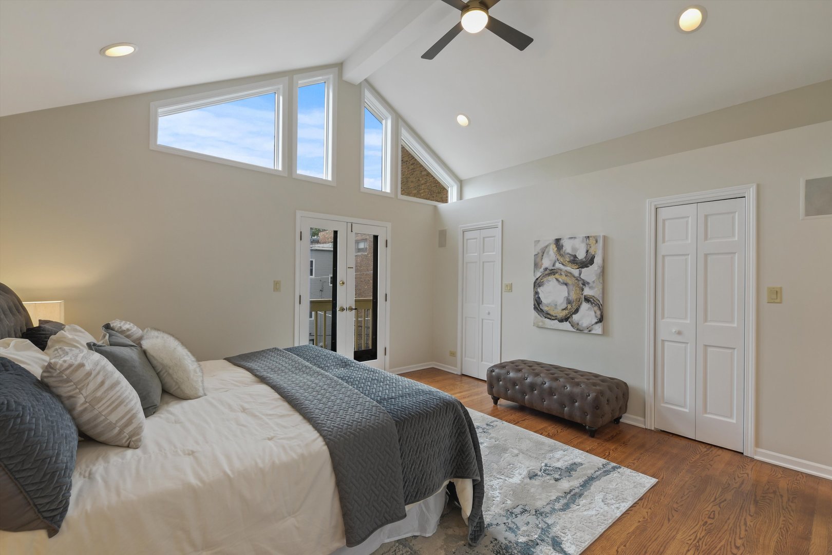 1447 West Flournoy Street Chicago, IL 60607 - Photo 16 of 41 a bedroom with a bed and painting on the wall