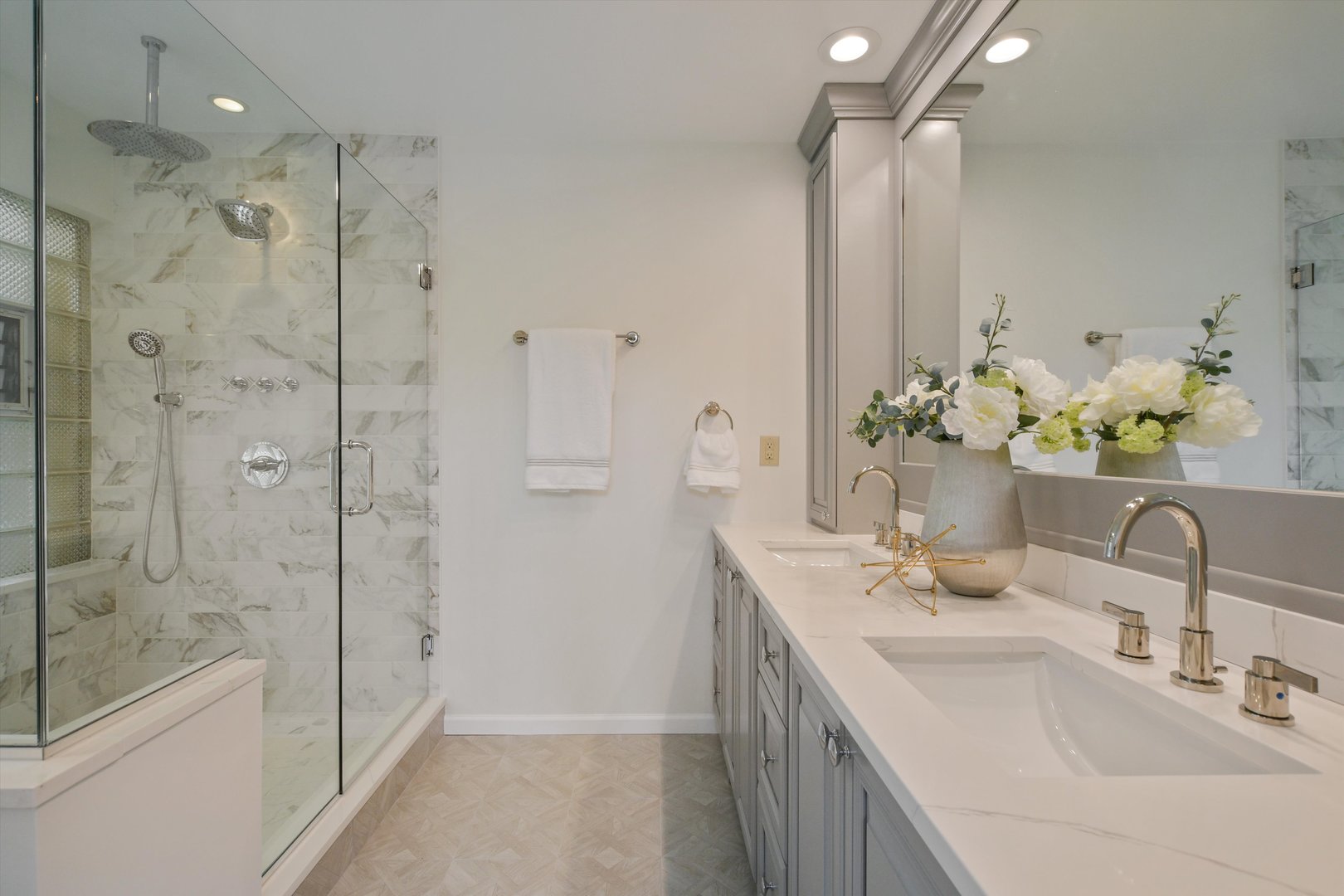 1447 West Flournoy Street Chicago, IL 60607 - Photo 18 of 41 a bathroom with a shower sink and mirror