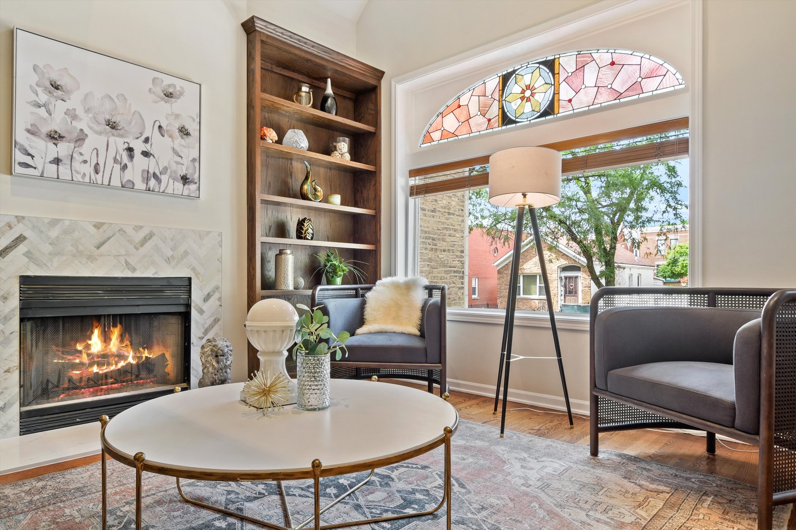 1447 West Flournoy Street Chicago, IL 60607 - Photo 2 of 41 a living room with furniture a fireplace and a large window