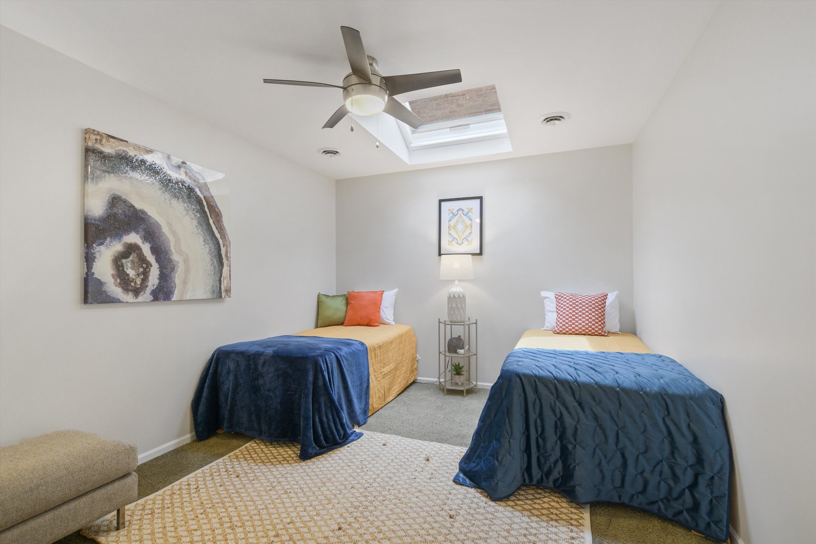 1447 West Flournoy Street Chicago, IL 60607 - Photo 22 of 41 a bedroom with double bed and a painting on the wall