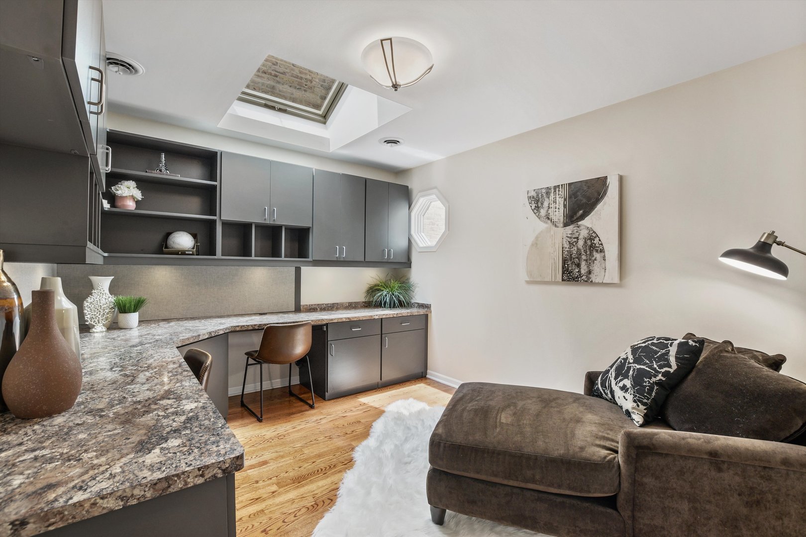 1447 West Flournoy Street Chicago, IL 60607 - Photo 23 of 41 a living room with stainless steel appliances granite countertop furniture and a couch