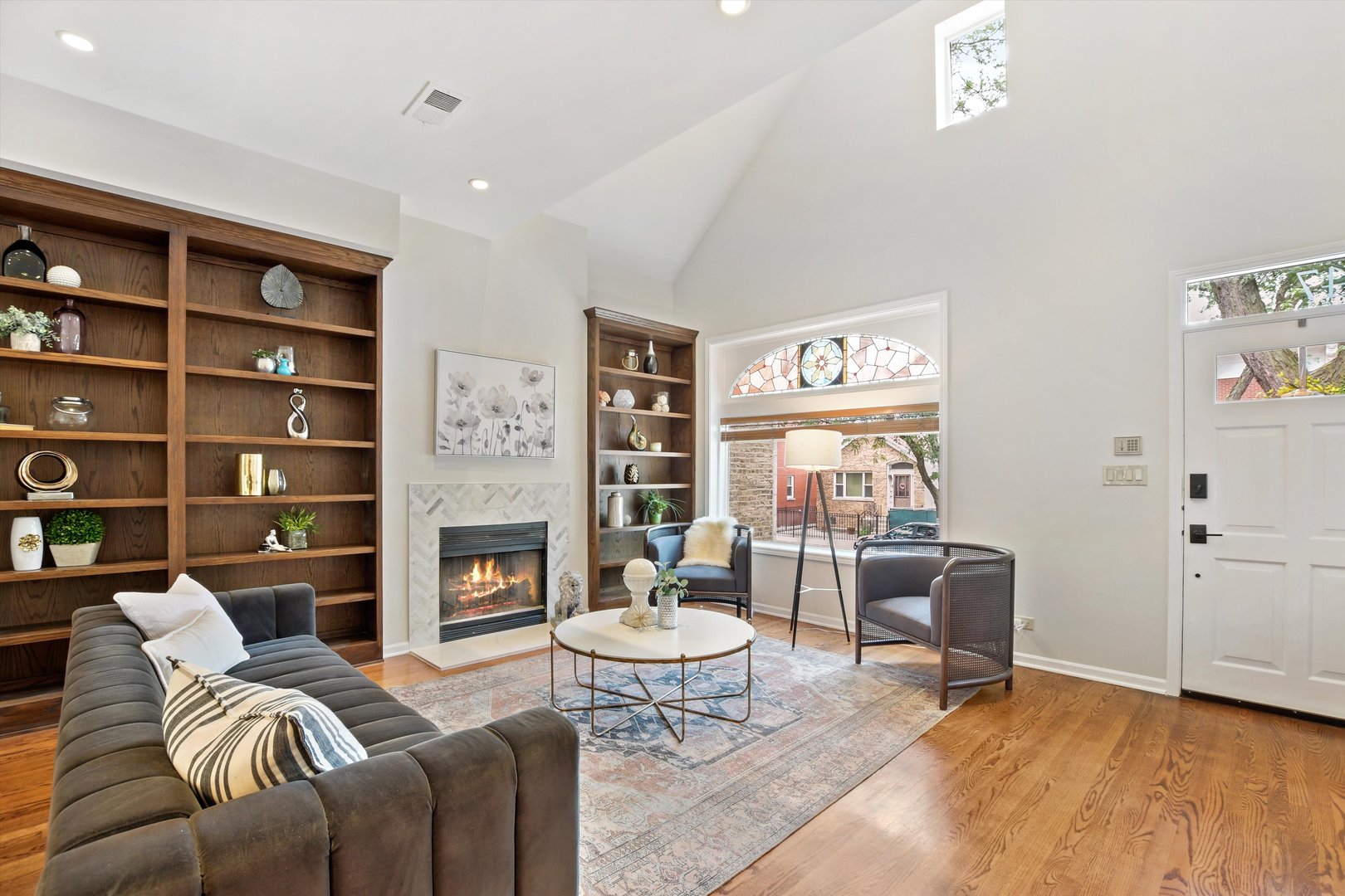 1447 West Flournoy Street Chicago, IL 60607 - Photo 3 of 41 a living room with furniture and a fireplace