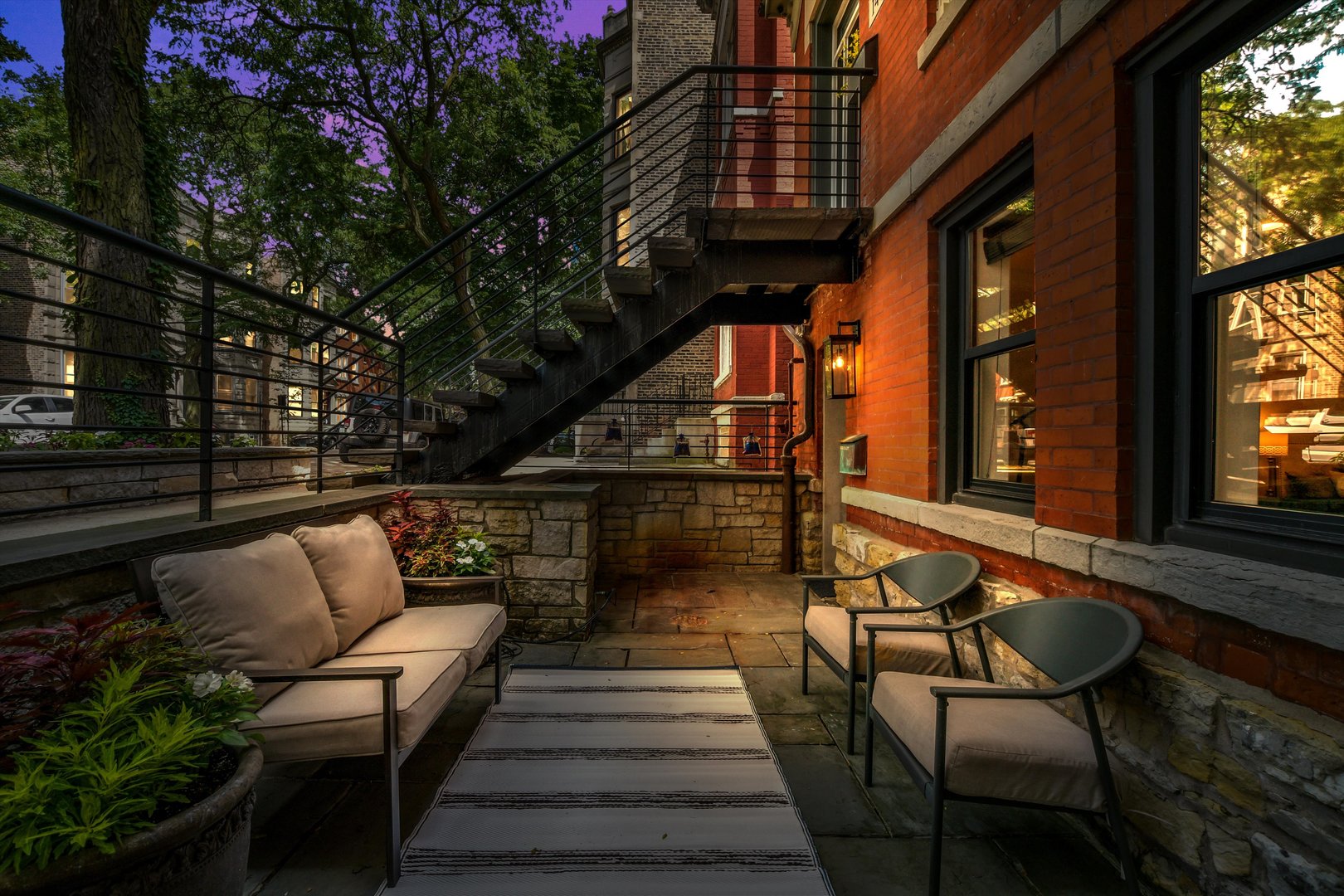 1447 West Flournoy Street Chicago, IL 60607 - Photo 35 of 41 a balcony with wooden floor and outdoor seating