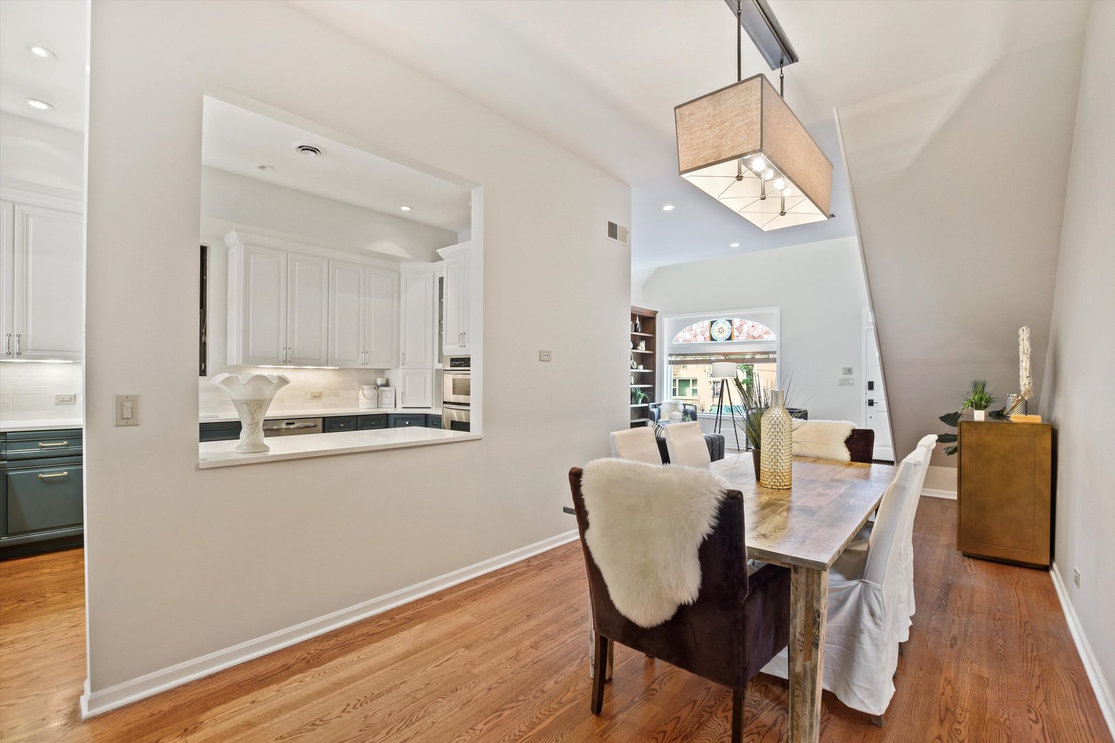 1447 West Flournoy Street Chicago, IL 60607 - Photo 6 of 41 a view of a dining room with furniture and wooden floor