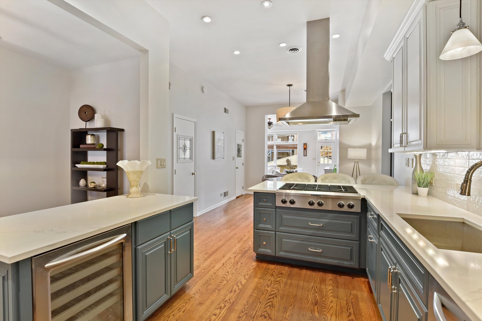 1447 West Flournoy Street Chicago, IL 60607 - Photo 9 of 41 a kitchen with stainless steel appliances granite countertop a stove a sink and a refrigerator