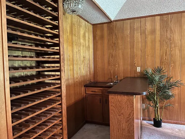 a living room with furniture fireplace and flat screen tv