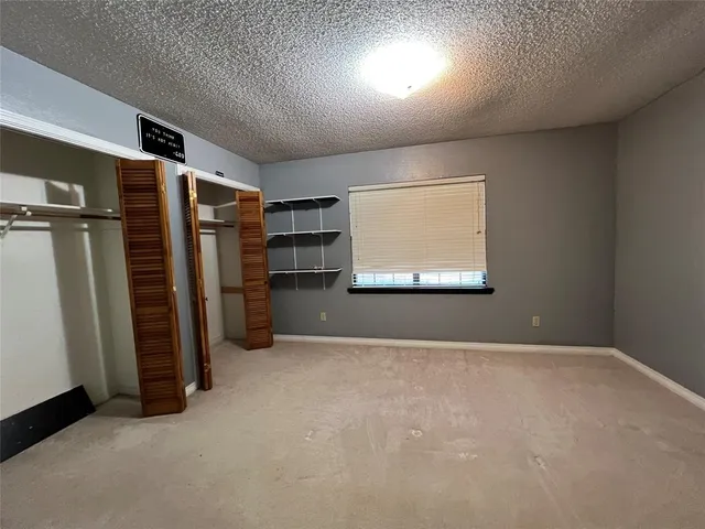 wooden floor and closet in a room