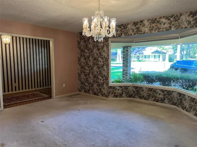 a bathroom with a sink a mirror and a bathtub