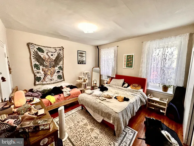 a bed room with a bed and a couch