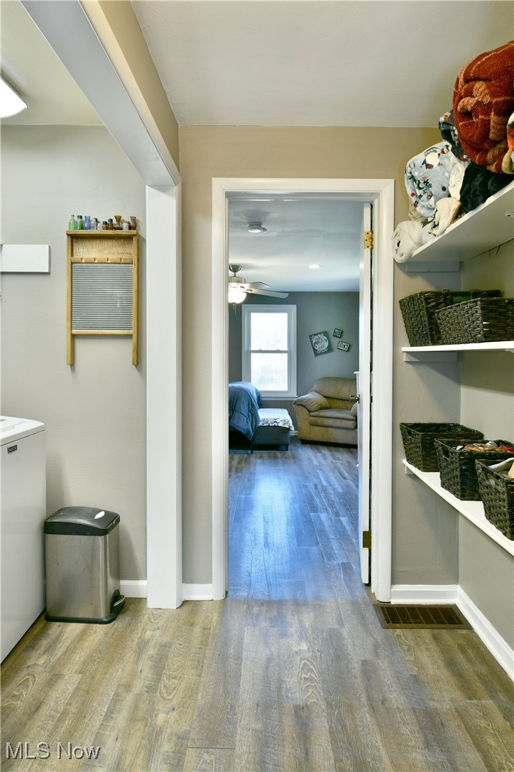 600 Prentice Road Northwest Warren, OH 44481 - Photo 23 of 47 Hallway featuring wood-style flooring