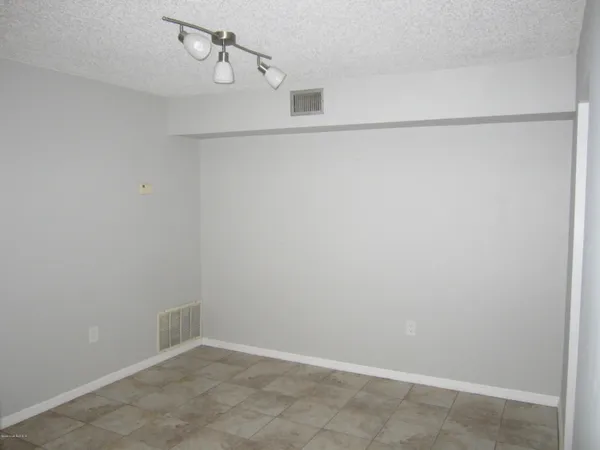 a view of small space with racks on the wall