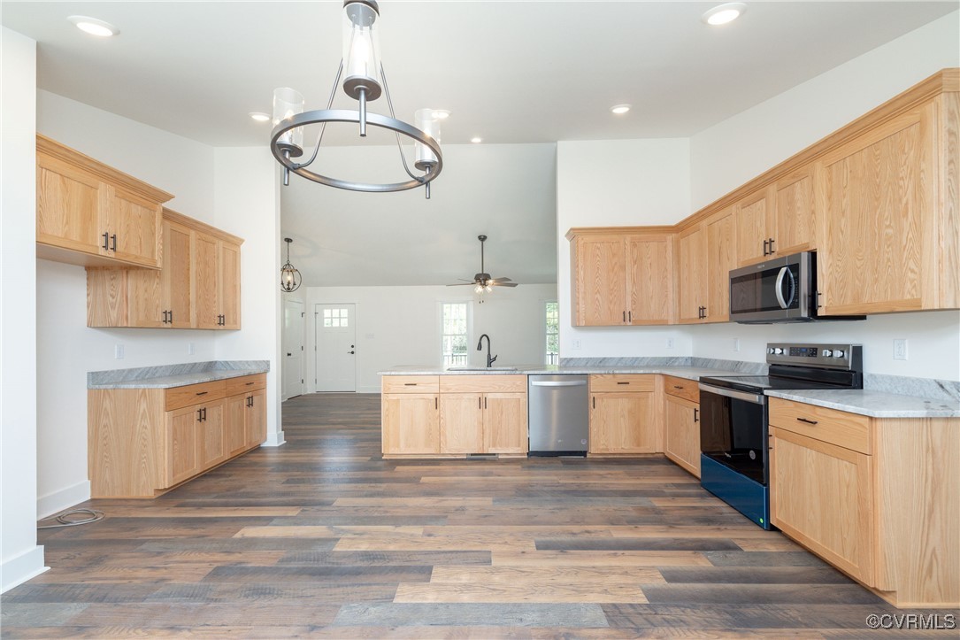 1304 Trimmers Shop Rd Point West Point, VA 23181 - Photo 2 of 12 a large kitchen with cabinets wooden floor and stainless steel appliances