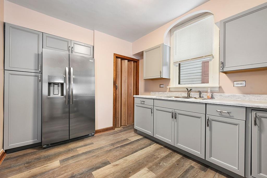3518 7th Avenue Beaver Falls, PA 15010 - Photo 13 of 28 a kitchen with stainless steel appliances granite countertop a refrigerator and a sink