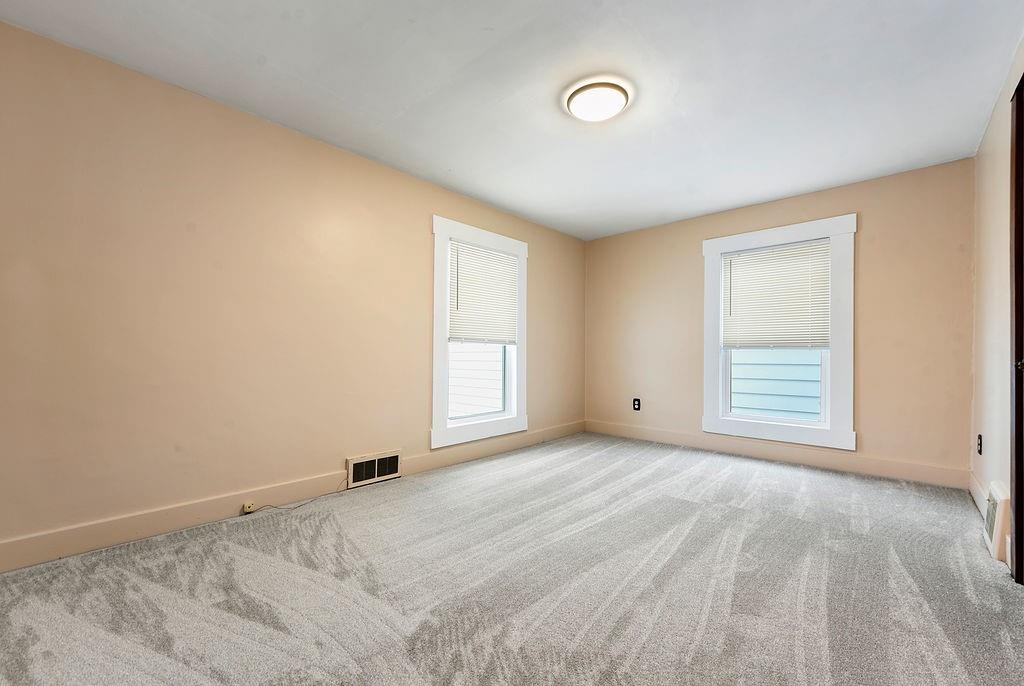 3518 7th Avenue Beaver Falls, PA 15010 - Photo 17 of 28 a view of an empty room with a window