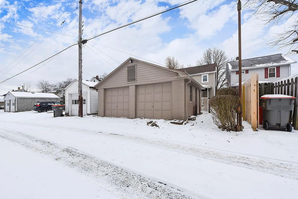 3518 7th Avenue Beaver Falls, PA 15010 - Photo 28 of 28 a wooden bench sitting on the side of a road