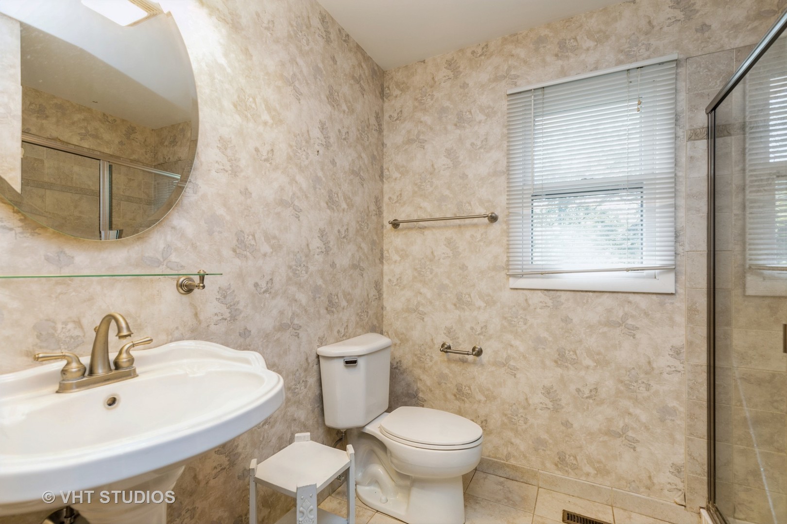 1335 Zange Drive Algonquin, IL 60102 - Photo 12 of 22 a bathroom with a sink a toilet and mirror