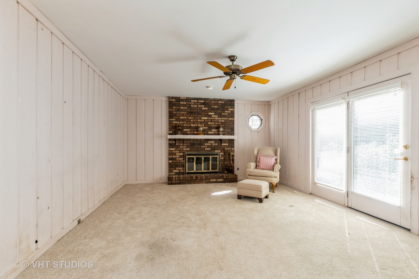1335 Zange Drive Algonquin, IL 60102 - Photo 6 of 22 an empty room with windows and ceiling fan
