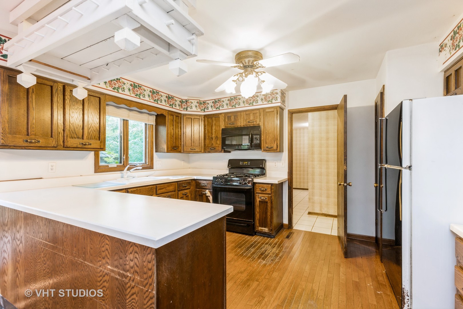 1335 Zange Drive Algonquin, IL 60102 - Photo 8 of 22 a kitchen with stainless steel appliances granite countertop a refrigerator a stove and a sink