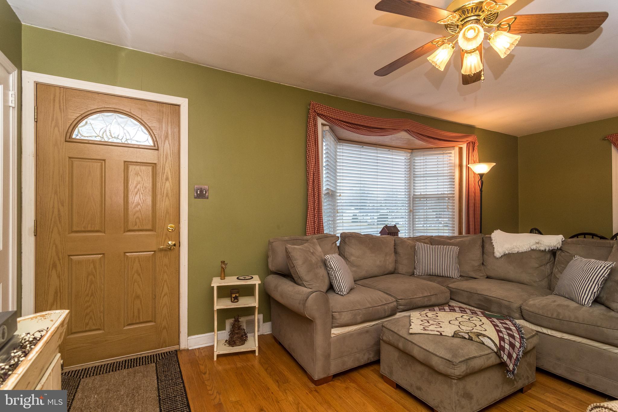 1902 Carton Road Hatboro, PA 19040 - Photo 8 of 45 Living room with Bay window and hardwood floors