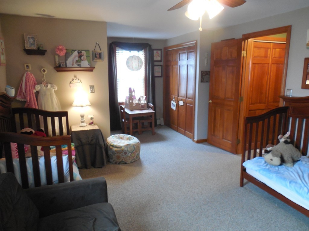 252 Pelham Street Fall River, MA 02721 - Photo 16 of 18 a living room with furniture and a window