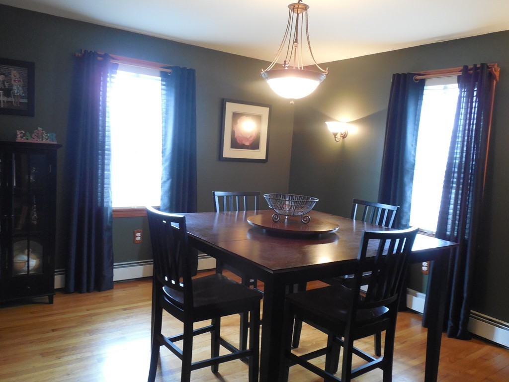 252 Pelham Street Fall River, MA 02721 - Photo 8 of 18 a view of a dining room with furniture and window
