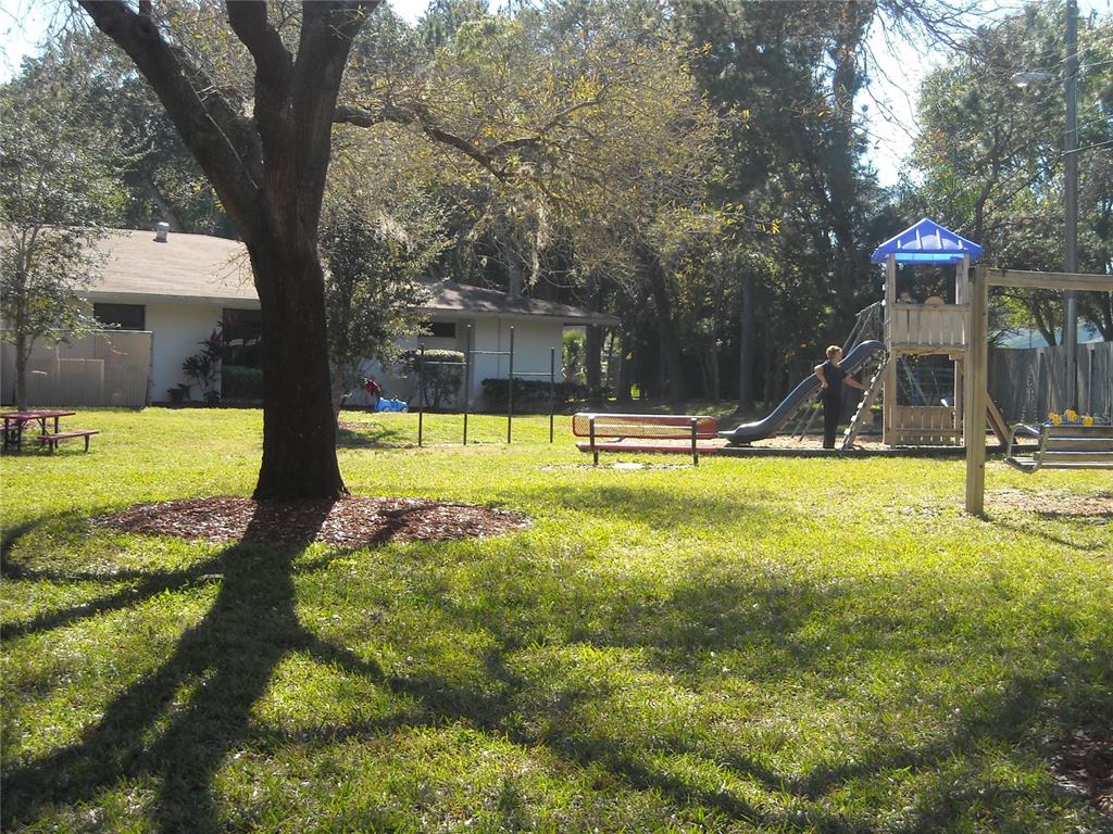 2375 Fox Chase Boulevard, Unit 260 Palm Harbor, FL 34683 - Photo 28 of 38 a view of swimming pool with an outdoor space