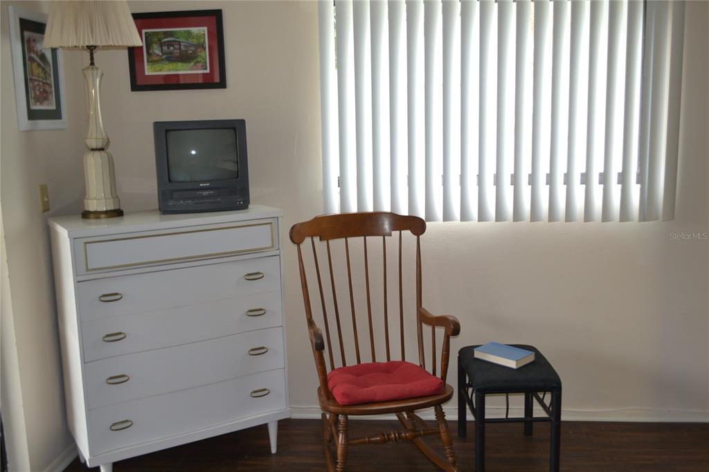 2375 Fox Chase Boulevard, Unit 260 Palm Harbor, FL 34683 - Photo 10 of 38 a view of a room with a table and chair