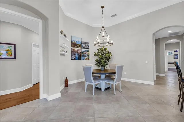a view of a dining room with furniture