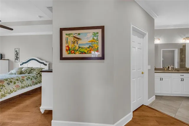 a bathroom with a double vanity sink toilet and shower