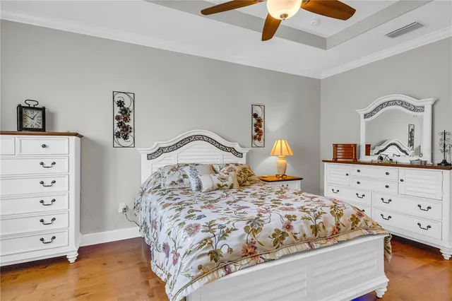 a view of a pathway with a flower in a garden