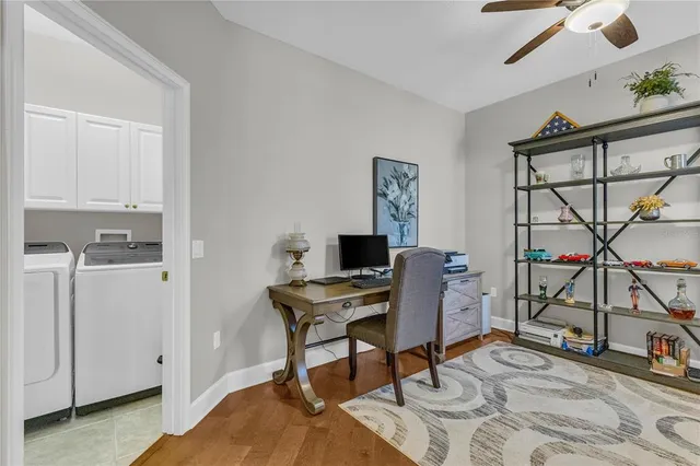 a workspace with furniture and window