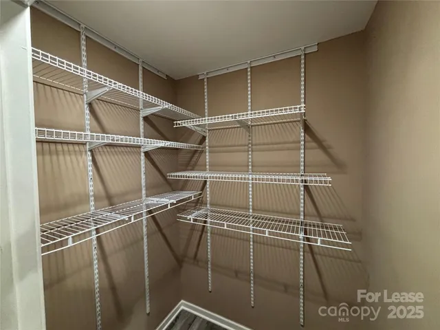 a view of a room with racks on the wall