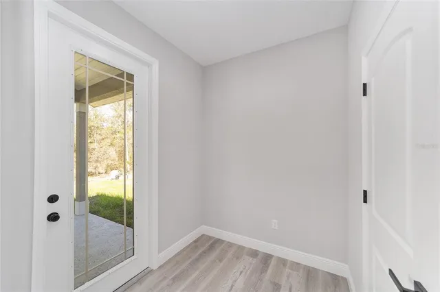 a view of porch with a floor to ceiling window and a big room
