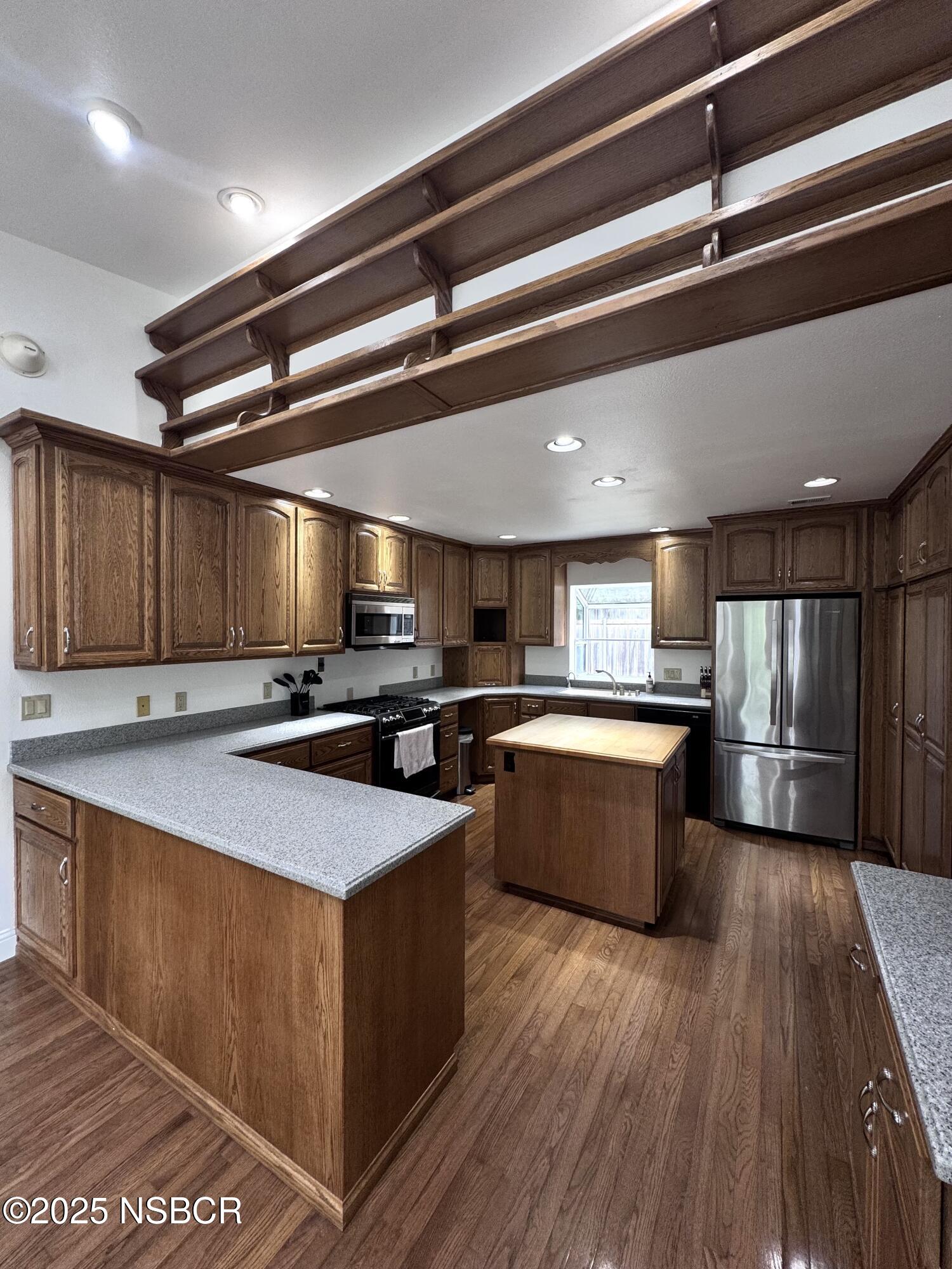 1485 San Miguelito Road Lompoc, CA 93436 - Photo 5 of 10 a large kitchen with lots of counter space
