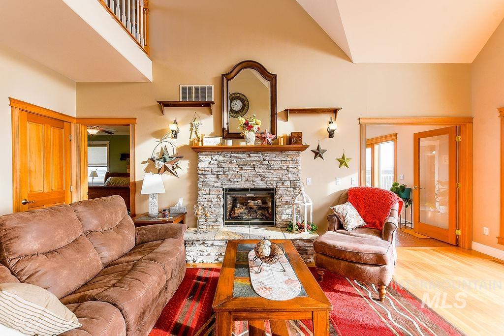 18072 Central Grd Genesee, ID 83832 - Photo 12 of 50 Living room featuring a fireplace and wood finished floors