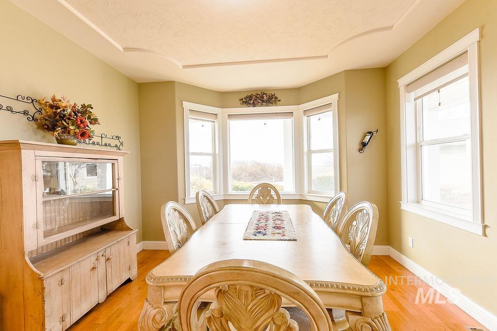 18072 Central Grd Genesee, ID 83832 - Photo 18 of 50 Dining area with light wood finished floors and a textured ceiling