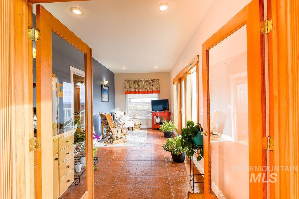 18072 Central Grd Genesee, ID 83832 - Photo 22 of 50 Corridor featuring recessed lighting, tile patterned flooring, and french doors