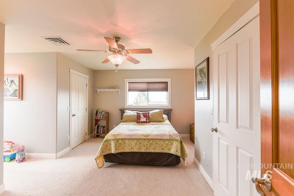 18072 Central Grd Genesee, ID 83832 - Photo 31 of 50 Bedroom featuring carpet and ceiling fan