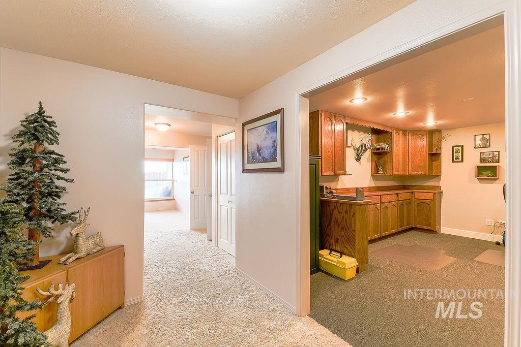 18072 Central Grd Genesee, ID 83832 - Photo 33 of 50 Hallway featuring light colored carpet