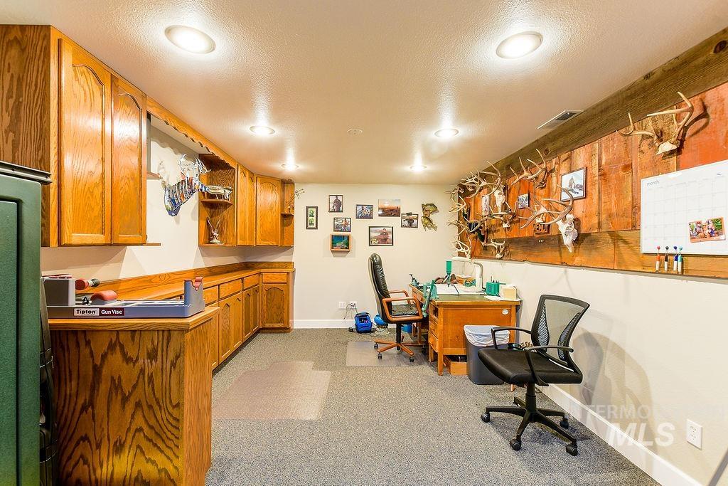 18072 Central Grd Genesee, ID 83832 - Photo 34 of 50 Office space featuring a textured ceiling, recessed lighting, and light carpet