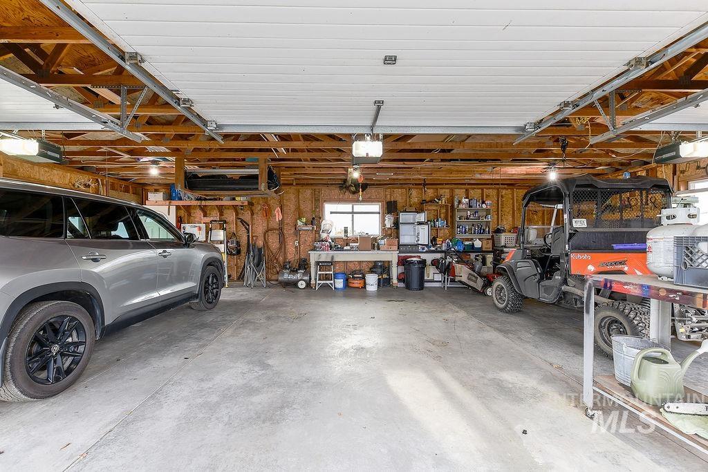 18072 Central Grd Genesee, ID 83832 - Photo 43 of 50 Garage featuring a workshop area and a garage door opener