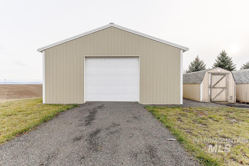 18072 Central Grd Genesee, ID 83832 - Photo 49 of 50 Detached garage featuring a shed