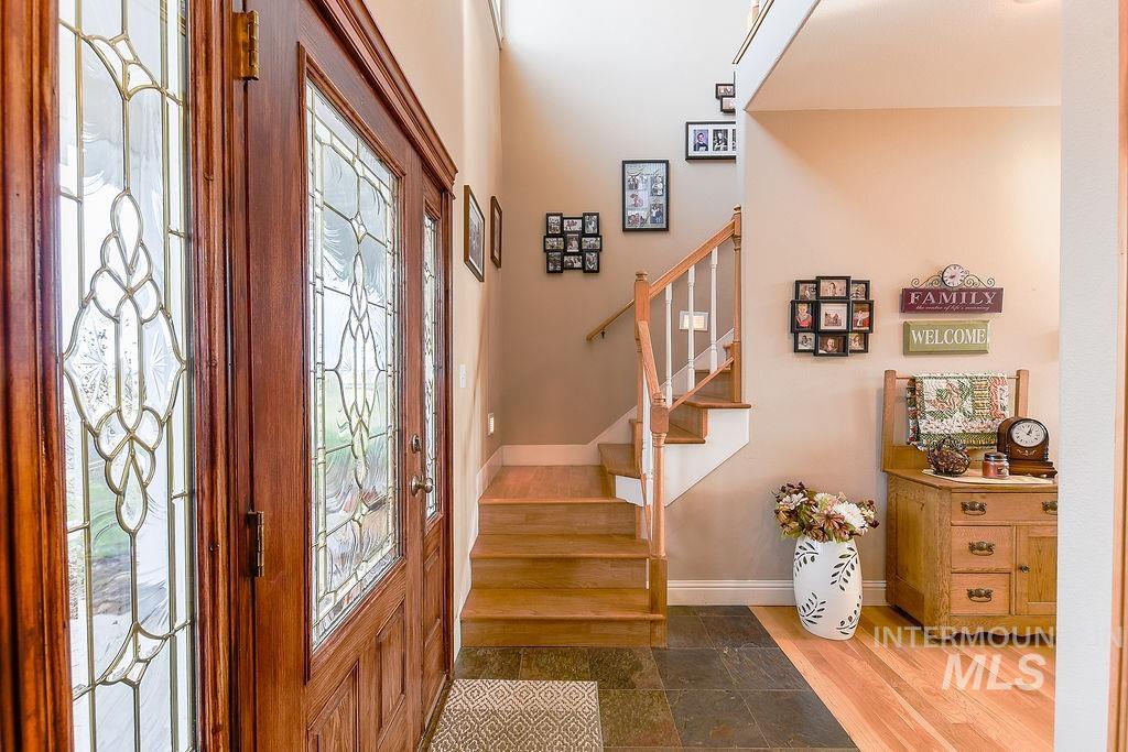 18072 Central Grd Genesee, ID 83832 - Photo 9 of 50 Entrance foyer featuring stairway and baseboards