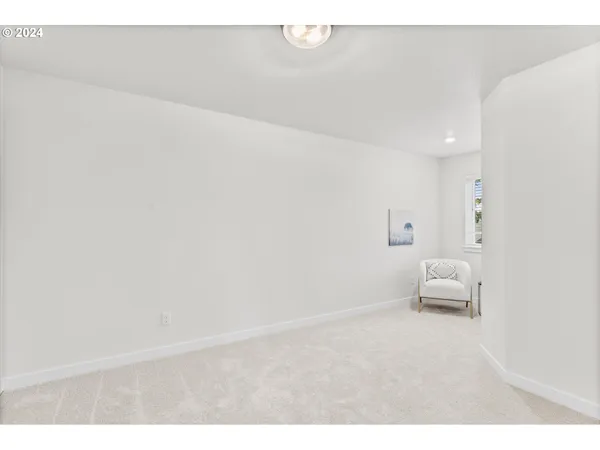 a room with a white wall